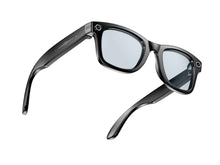 Charger l'image dans la galerie, "Lunettes connectées Mogie.Caméra - Modèle Zenia - Branches noires avec monture noire et verres photochromiques. Branche tactile - Caméra - Chat GPT - Verres photochromiques - Gestion playlist et appels Bluetooth - Assistant vocal Monture : Noire"